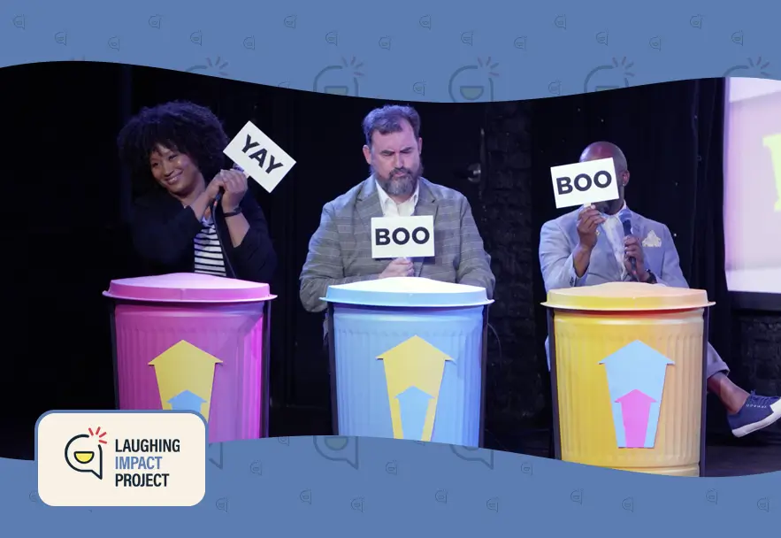 this is an image of comedian/improviser/theatre makers, Eunice Elliott, Rich Mansfield, Christopher Davis,performing at the debut of Everything is Great town hall comedy show event produced by Laughing Impact.